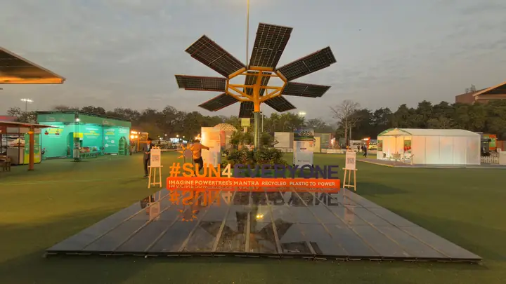 Solar Tree lit up at an evening exhibition